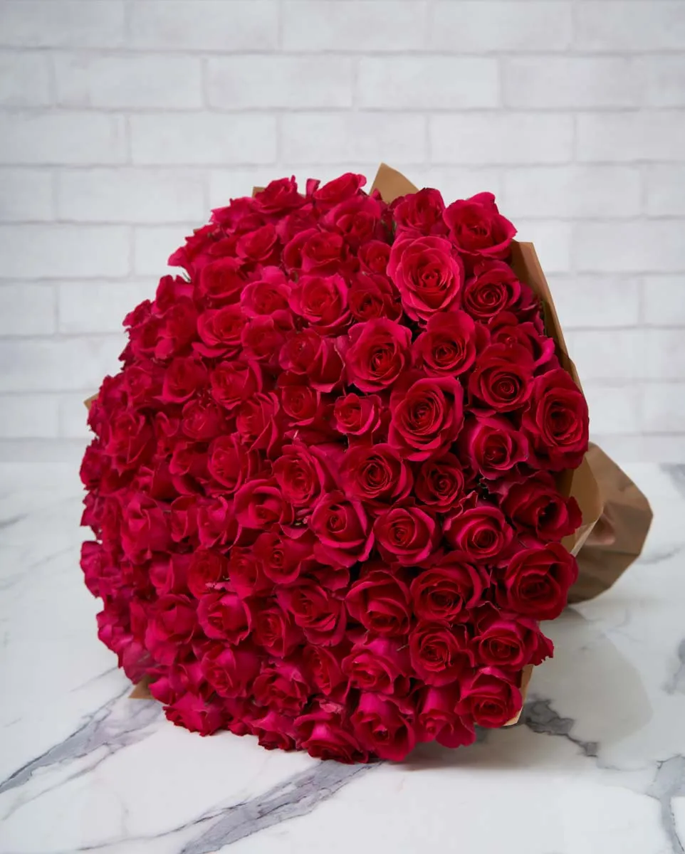 100 cerise roses brown wrap