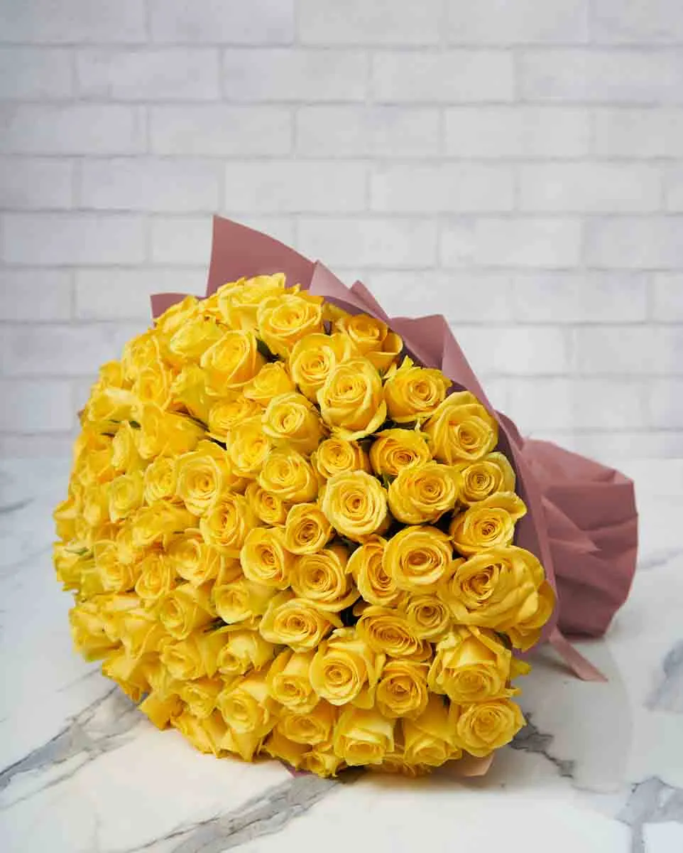 100 yellow roses pink wrap