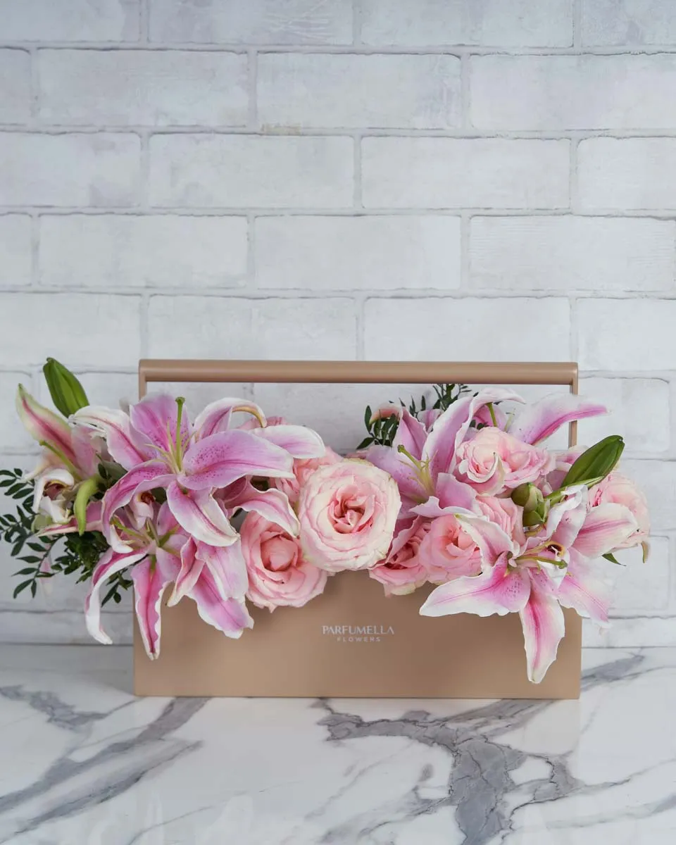 Perfect Pair   Toolbox Combination of Pink Lily and rose esperance with touch of pistacia 4 lilys  12 esperance  .5 pistacia