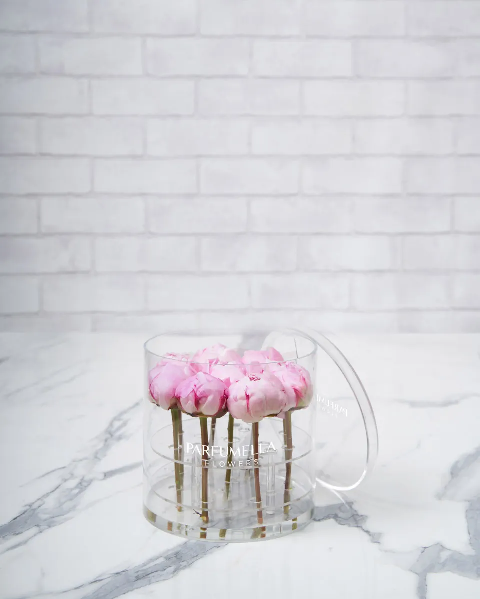 pink peony on round acrylic  White Logo